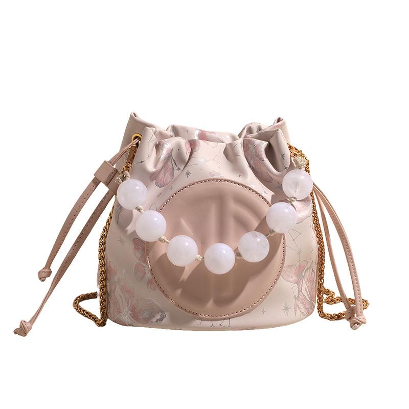 

Bag women s 2025 new summer crossbody bag retro versatile shoulder bag bucket bag is popular this year розовый