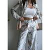 European and American cross-border women's suit 2024 new spring and summer fashion positioning printed long-sleeved top wide-leg pants two-piece set