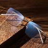 Rimless Titanium Alloy Unisex Glasses: Retro Light Luxury Frame for a High-End Feel