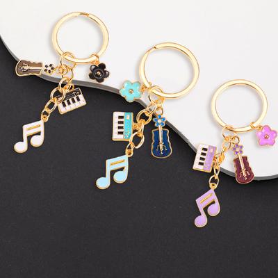 Llaveros creativos de guitarra y piano, instrumento musical de metal, colgante para mujeres y hombres, regalo de amistad, bolso de mano, decoración, joyería Y2k