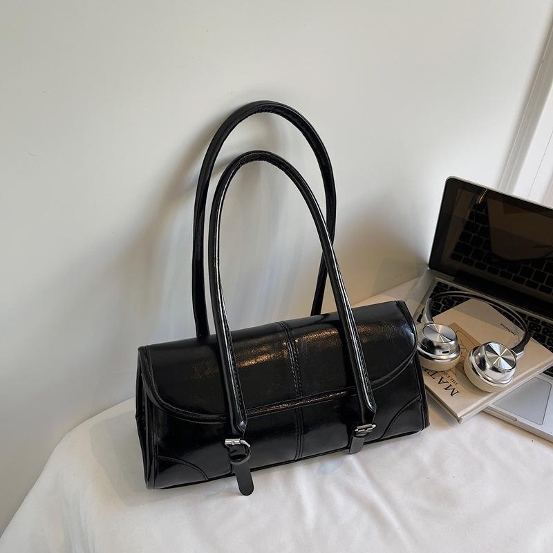 

Женская сумка-багет из кожи с масляной восковой пропиткой, дизайнерская нишевая сумка на плечо высокого класса, большая вместимость, универсальная, длинная, для通勤, женская сумка