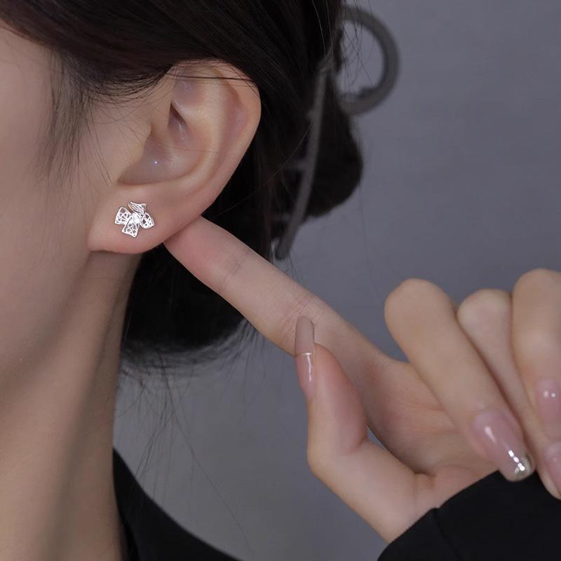 Female Summer Hollow Bow Earrings