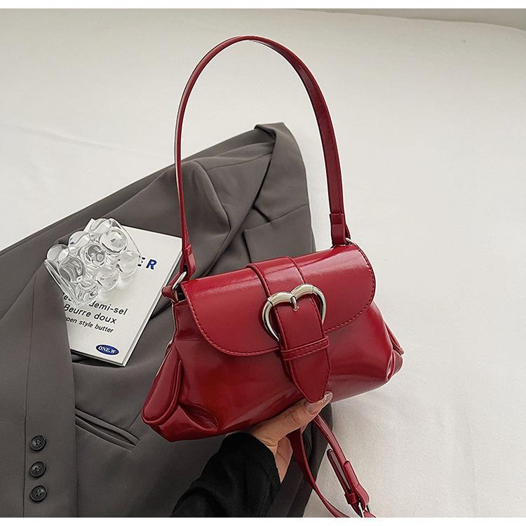 

2025 spring new simple niche design shoulder women s bag casual commuting oil wax leather texture versatile messenger bag червоний