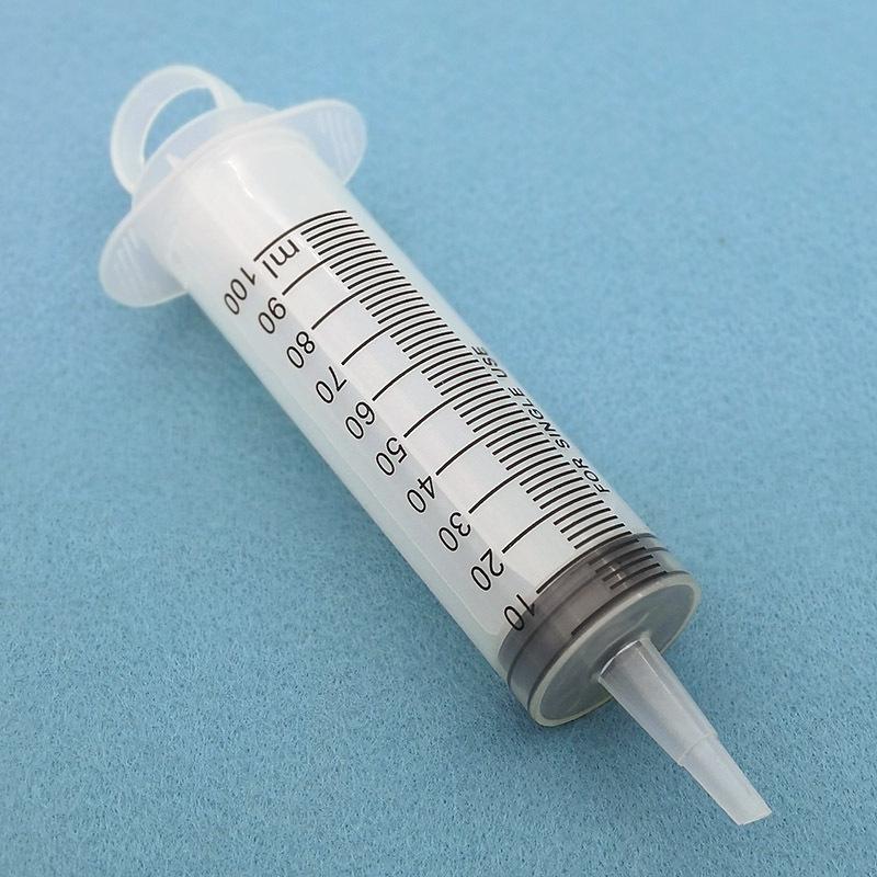 High-Capacity Flushing Syringe with Coarse Needle for Glue or Enema