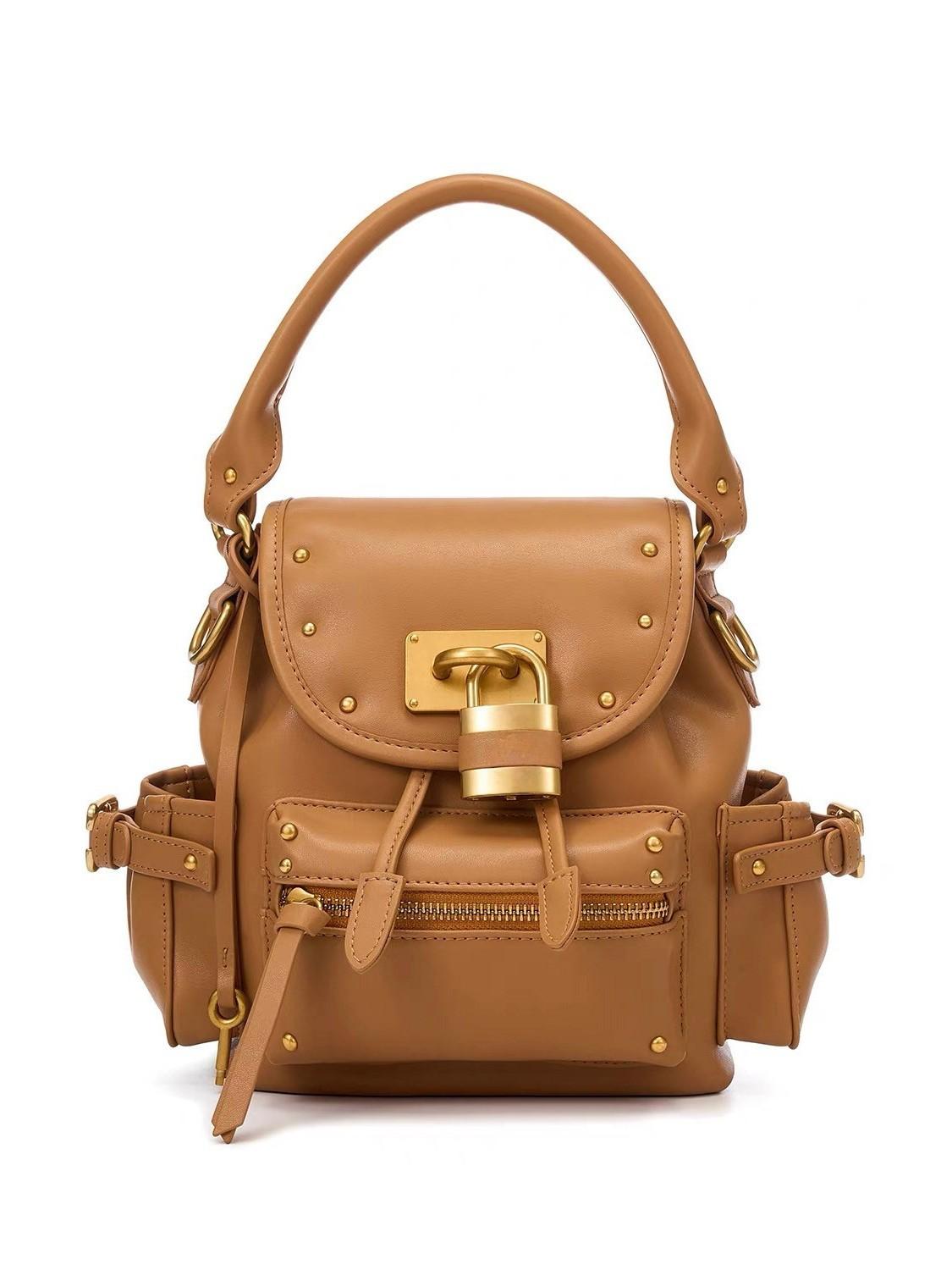 

Brand Lock Design Leather Backpack Rivet Detail Top-handle Bag New Niche Fashi Versatile Commuter Backpack коричневий
