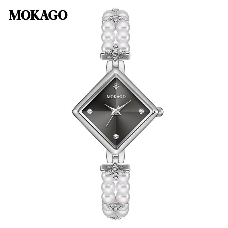 

Жіночий кварцовий годинник Moka High Pearl з діамантами, легка розкіш, водонепроникний, з циферблатом «ромбоподібні сонячні промені» та елегантним мідним браслетом. срібний/чорний