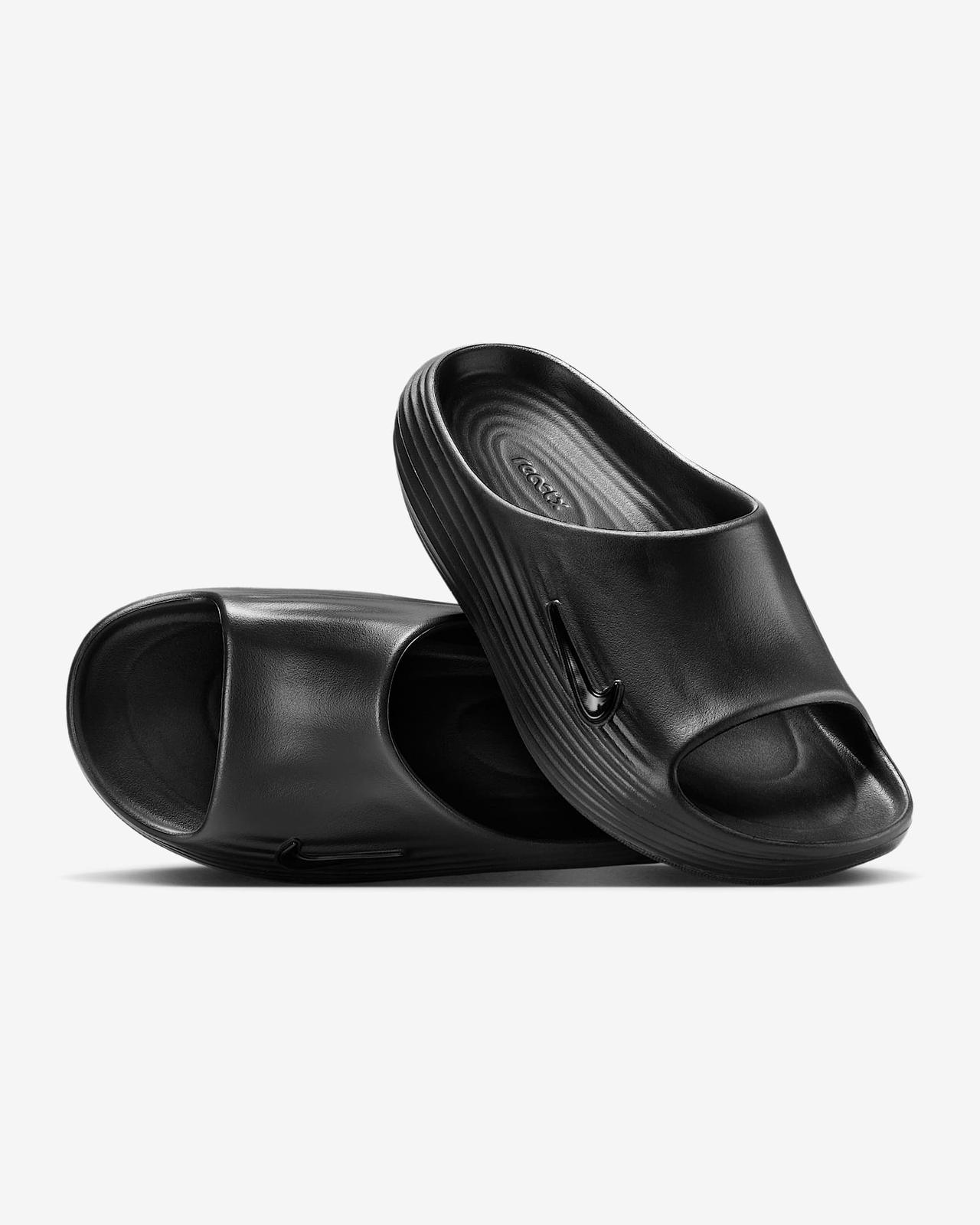 HV4484-001 Nike Women s ReactX Rejuven8 Slide Triple Black (Women s) 9W