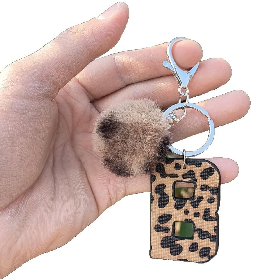 Western Cowboy Leopard Print Leather Keychain with Plush Ball Accessory