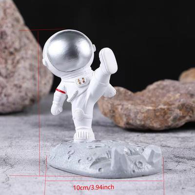 Creative Astronaut Phone and Tablet Stand - Fun Cartoon Design with Dynamic Astronaut Statues