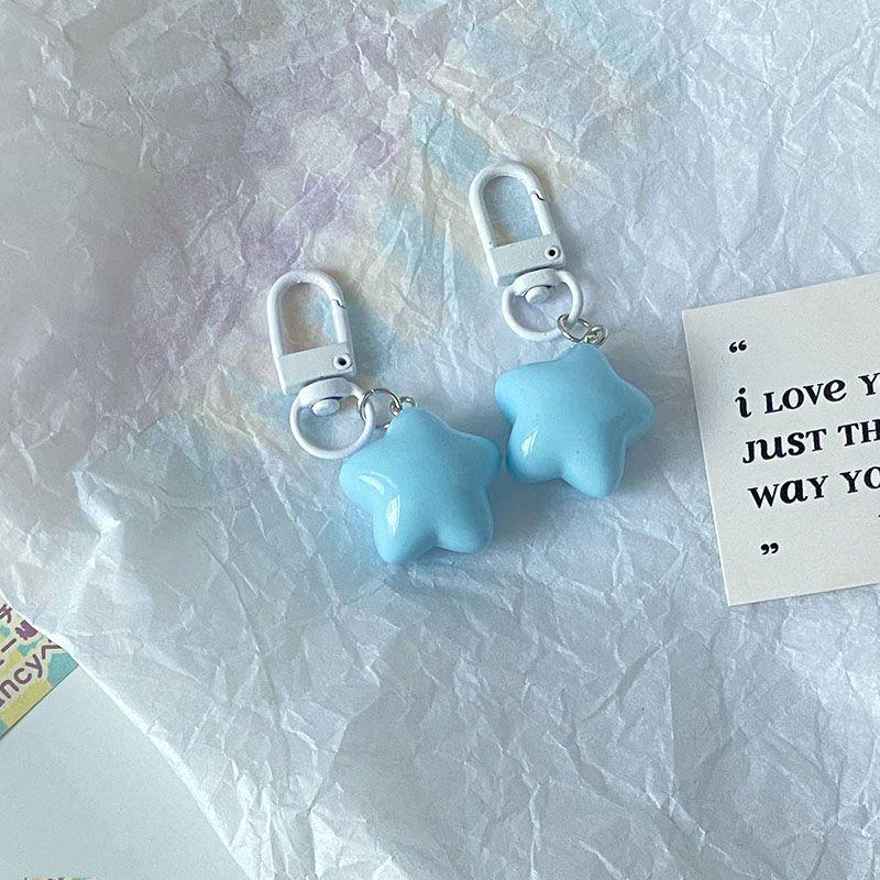 Chaveiro Estrela de Creme Gordinho: Pingente de Estrela de Cinco Pontas Fofo e Macio para Estudantes e Melhores Amigos.