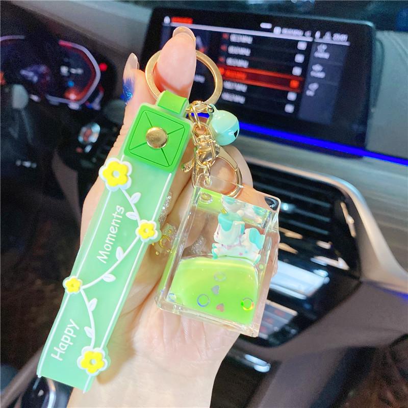 Lila Stern Flüssiger Treibsand Schlüsselanhänger mit Kirschblüten Öl-gefülltem Anhänger - Niedlicher 3D Rucksackanhänger für Frauen