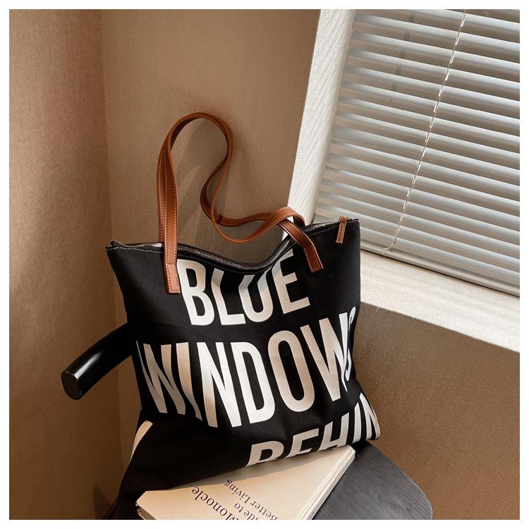 

Large-capacity bag women s autumn and winter versatile new simple canvas bag texture student single room bag commuter tote bag 41*4*37 чёрный