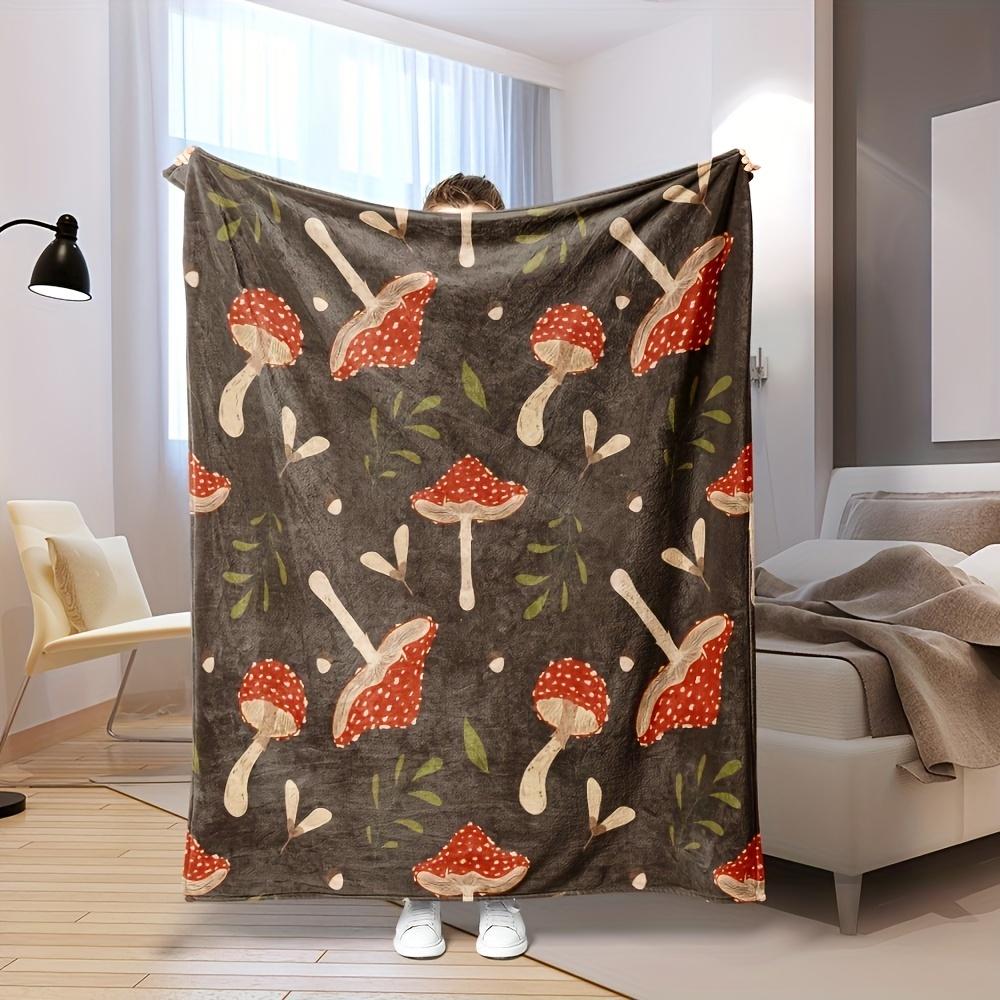 Flannel Mushroom Design Blanket with Red Spotted Mushrooms and Green Leaf Details for Warm Home Decor & Relaxing Living Comfort