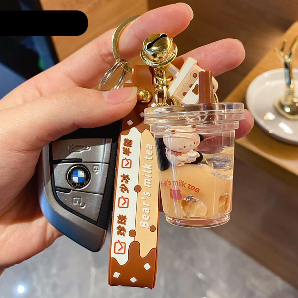 Cartoon oil floating liquid quicksand bottle pearl milk tea bear key chain cute trendy car key chain pendant Key Ring