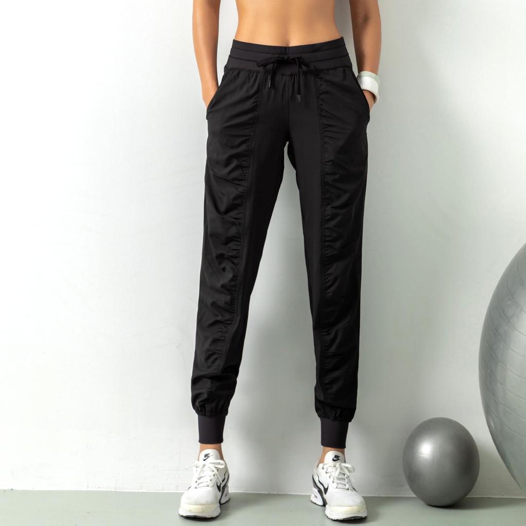 2021 Spring Women's Breathable Loose Fit Nine-Point Running Pants with Pockets