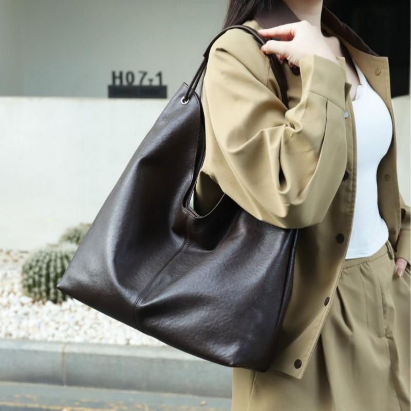 2025 Vegetable Tanned Cowhide Popular Large-capacity Tote Bag All-matching One-shoulder Class Armpit Commuter