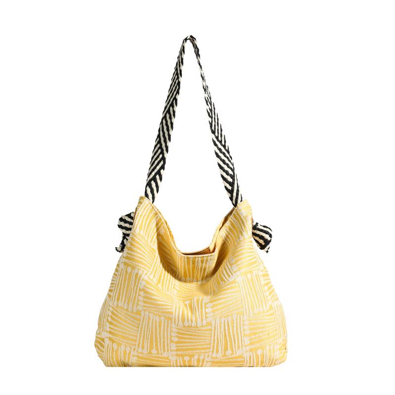 

Повседневная клетчатая сумка-тоут в иностранном стиле, большая вместимость, сумка через плечо под мышкой, нишевый дизайн, японская персонализированная сумка из ткани для поездок на работу жёлтый