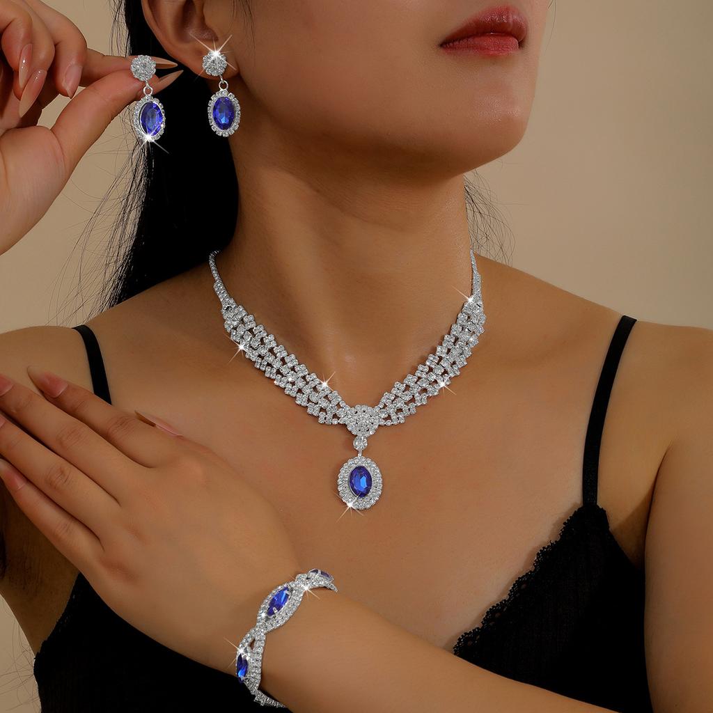 Luxuriöses Qualitäts-Tropfen-Halsketten-, Ohrring- und Armband-Schmuckzubehör-Set für Hochzeitskleider und Formelle Kleidung