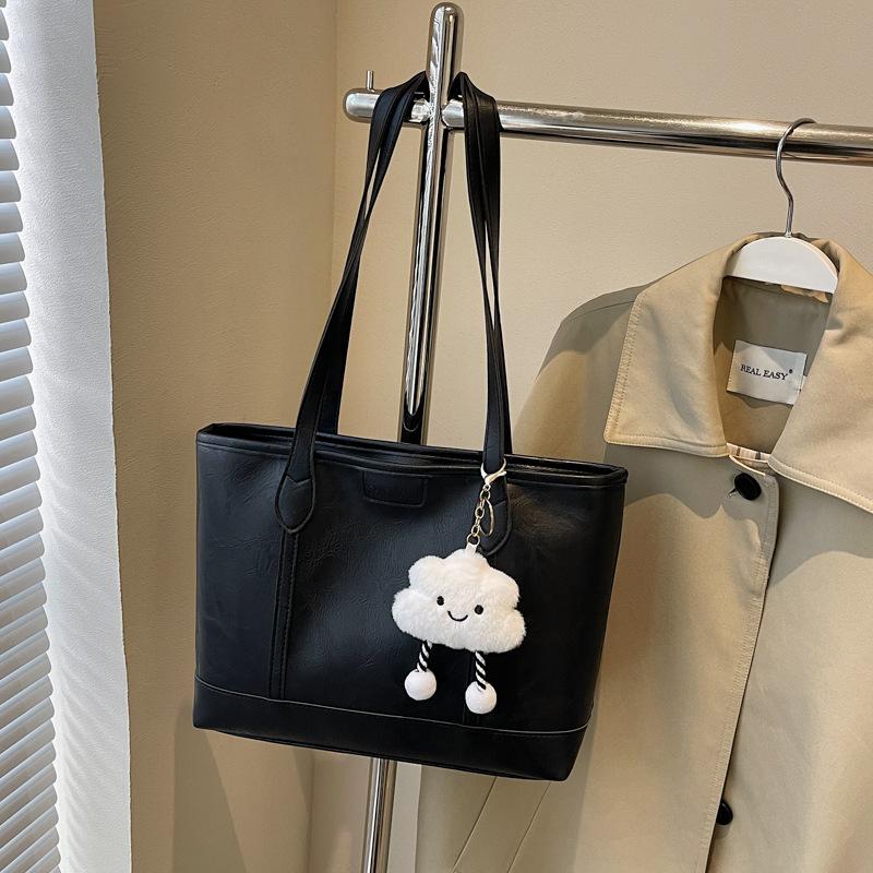 

Модная универсальная одноплечевая сумка большой вместимости с высоким эстетическим уровнем. Сумка-тоут для поездок на учебу. чёрный