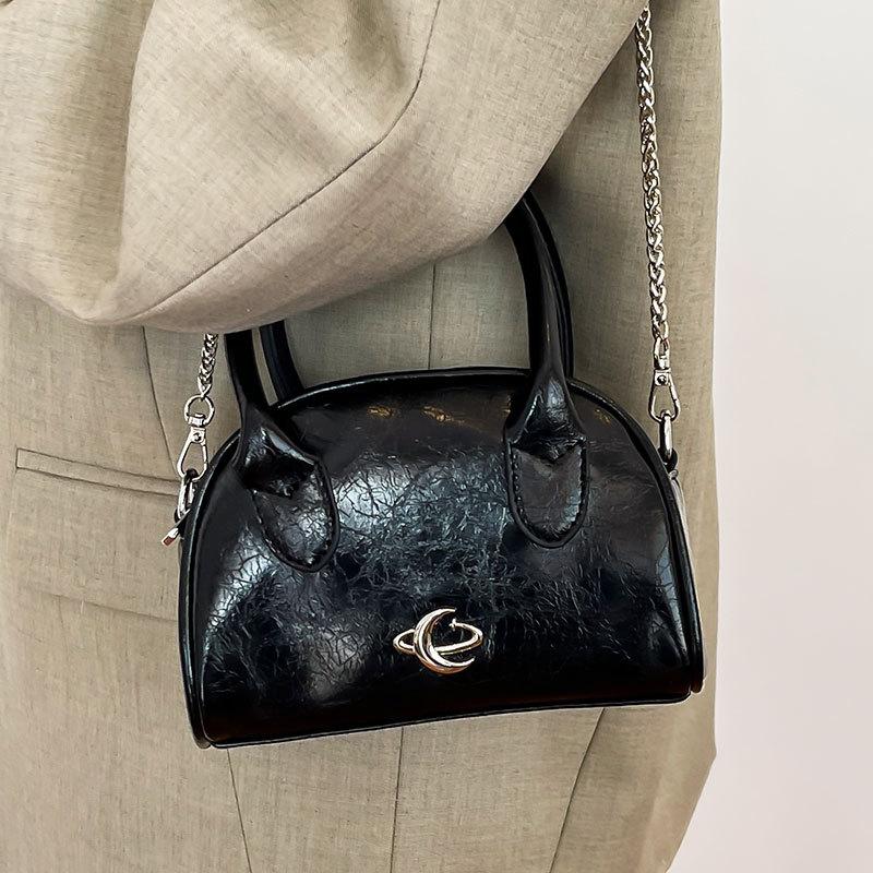 This year's new trendy high-end light luxury portable Boston bag niche design versatile solid color messenger women's bag