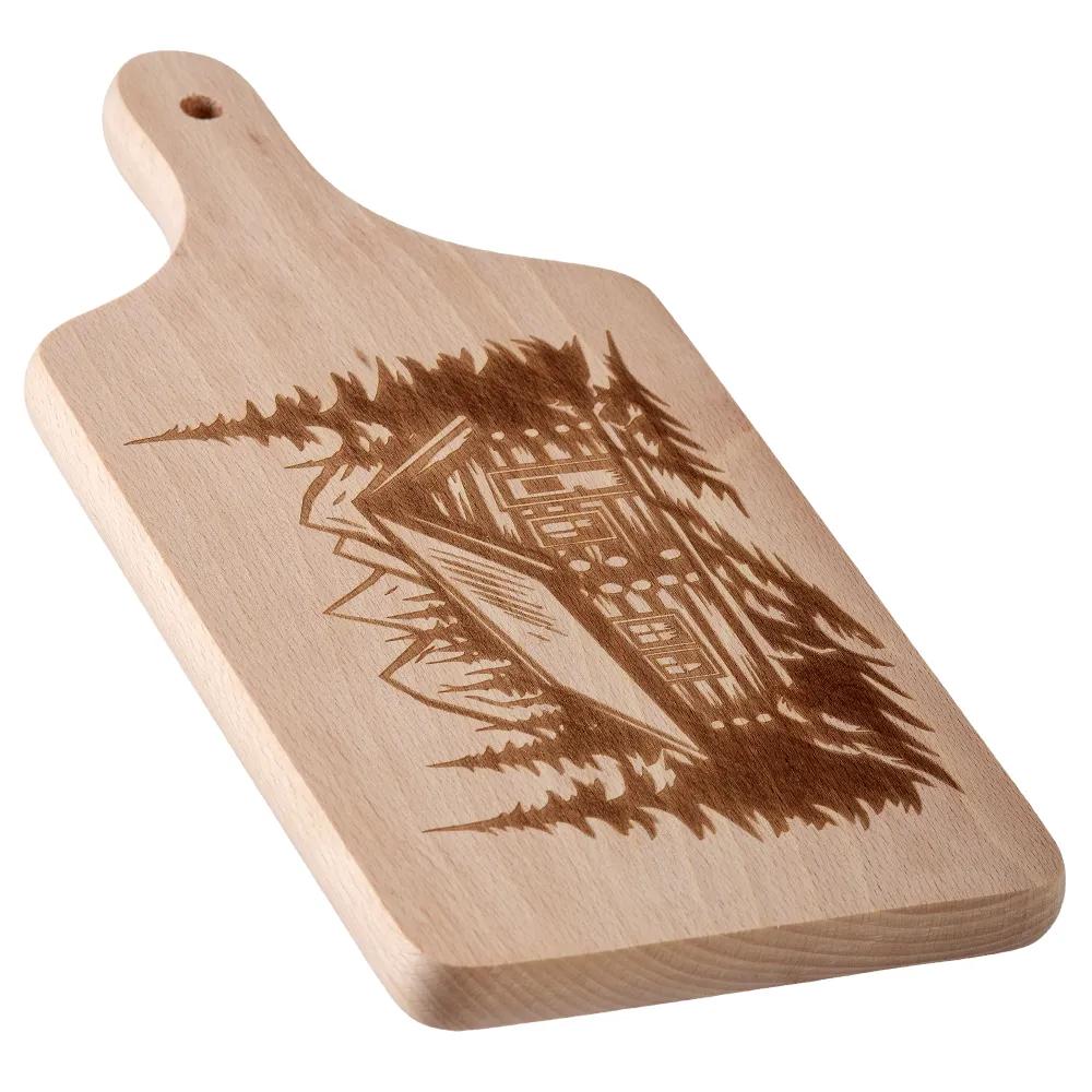 Wooden chopping board with an engraved mountain cottage