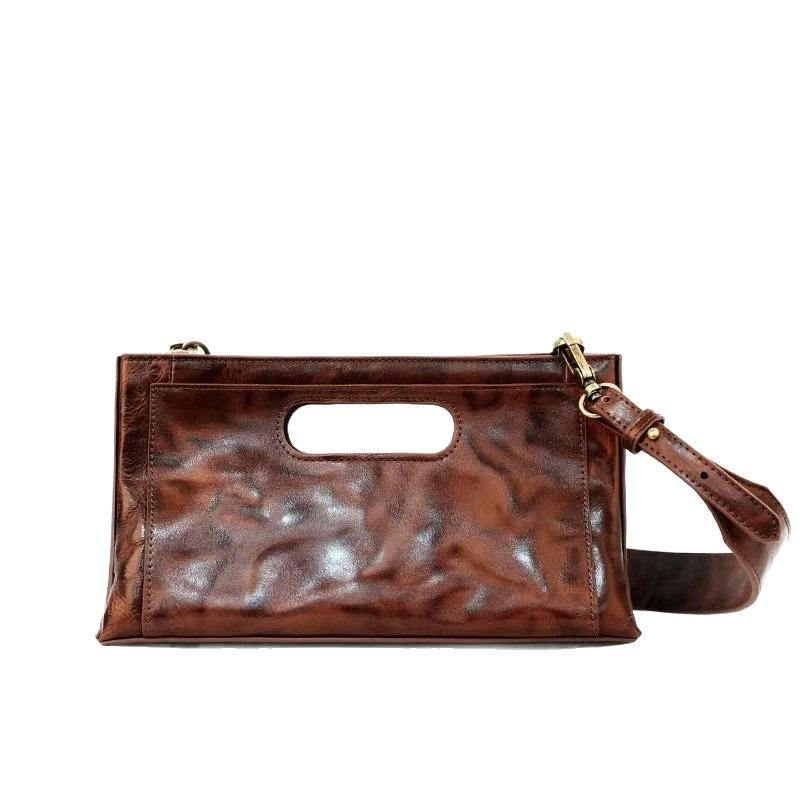 Cowhide tote bag women's new niche design chain underarm bag hand grab pleated pattern versatile shoulder bag