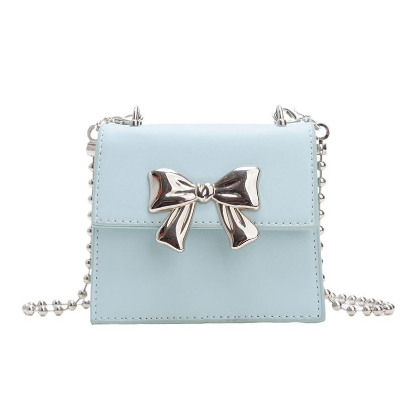 

Adorable Mini Bowknot Crossbody Bag For Kids Trendy Chain Design In Multiple Colors синій