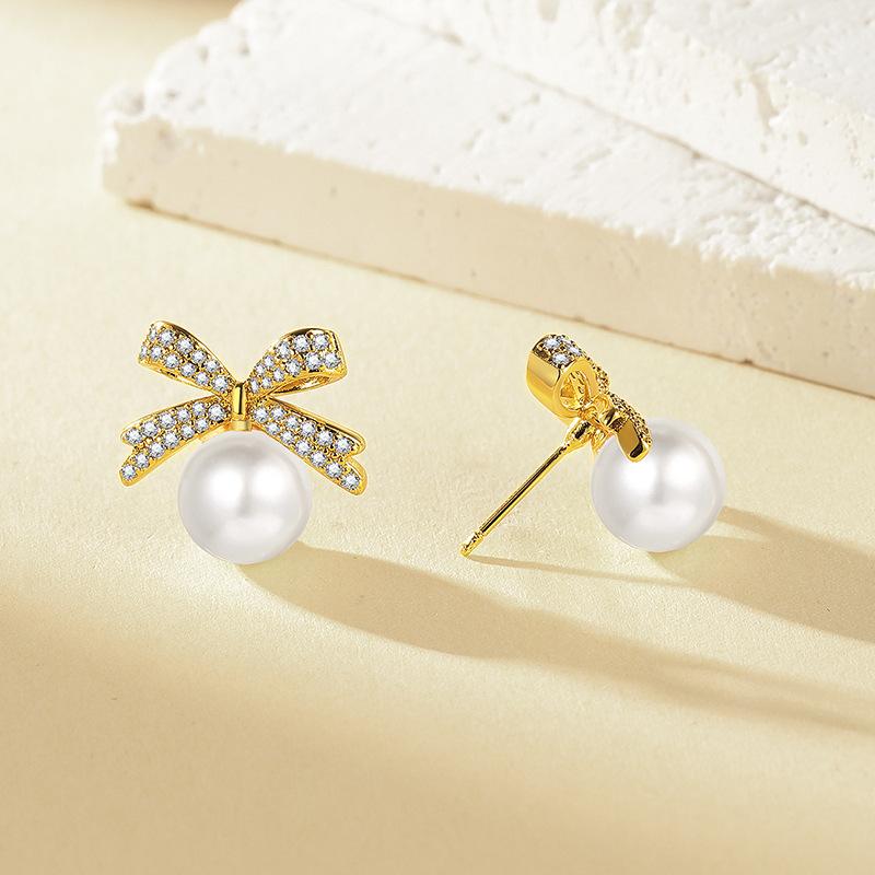 Japan and Korea Exquisite Micro-inlaid Zircon Bow Pearl Stud Earrings Women's Fashion Simple Small Versatile Earrings 2026
