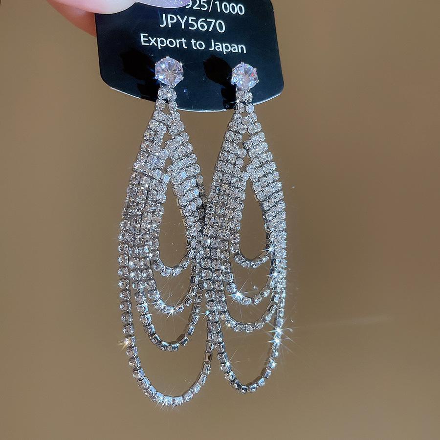 Silver Needle Water Drop Tassel Earrings - Light Luxury High-End Design for Women's Fashion.