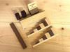 Stylish maple x walnut wooden domino set.
