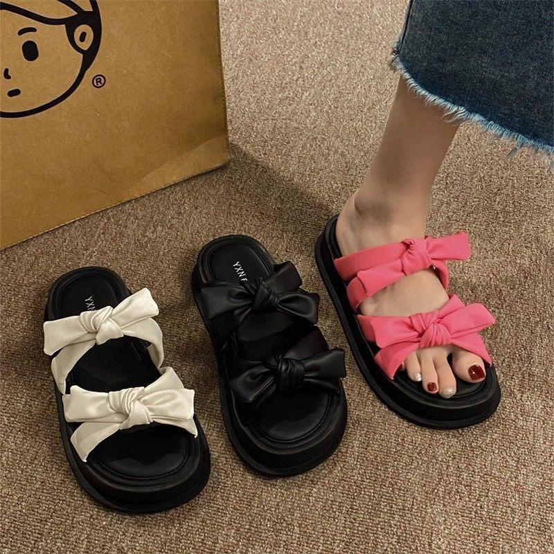 Thick-soled one-word slippers for women to wear summer new bows with skirts fashionable beach sandals