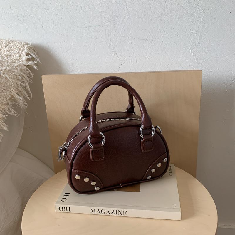 High-end niche bag women's retro new autumn and winter messenger bag fashionable portable bowling bag