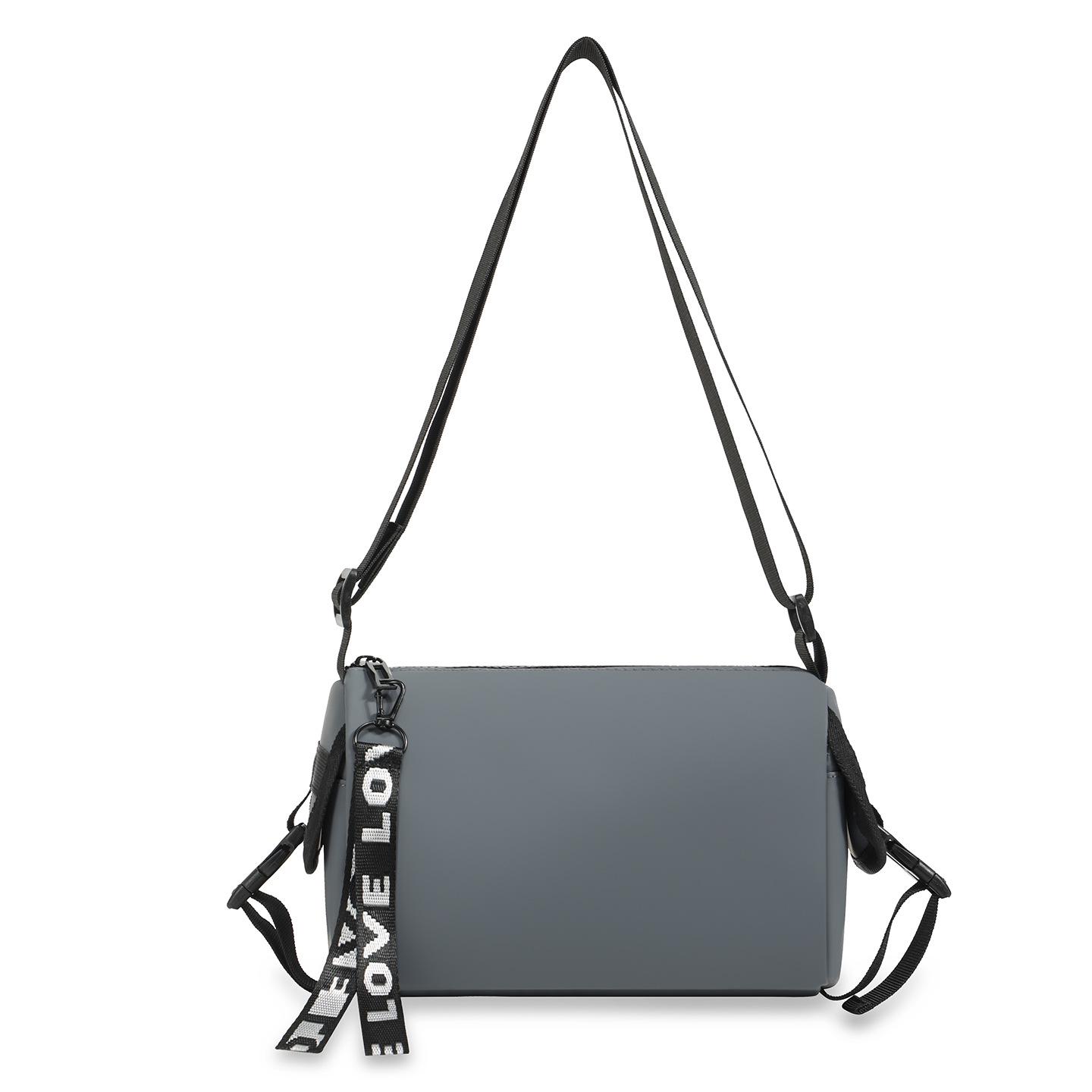 

Men s Trendy Lightweight Crossbody Bag: Casual Outdoor Commuting Cylinder with Versatile Letter Design. сірий колір