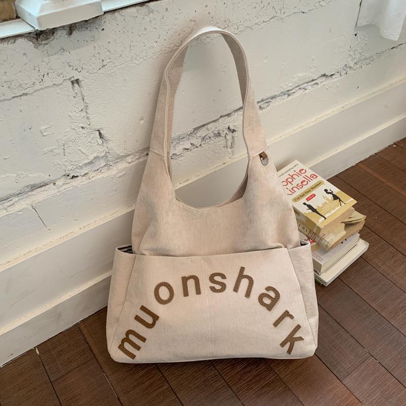 

Leisure college student class bag 2025 new commuter large-capacity women s shoulder bag portable tote bucket bag