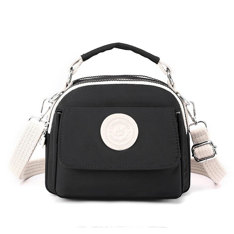 

New women s fashion trend messenger bag simple anti-splashing bag lipstick change portable handbag чорний