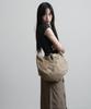Peanut Loop Spiral Canvas Cross Bag Beige