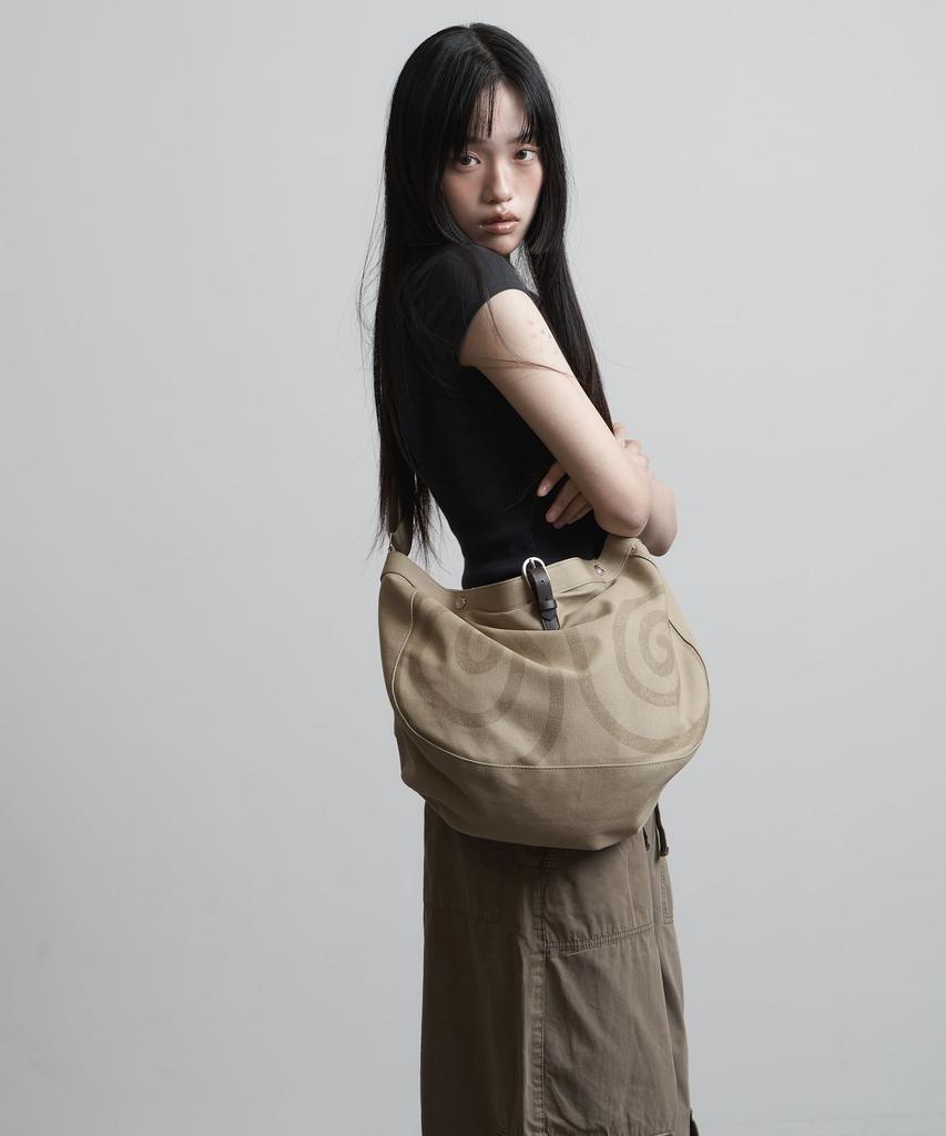 Peanut Loop Spiral Canvas Cross Bag Beige