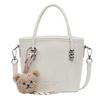 Solid color casual sweet bucket bag women's new solid color fashionable trendy messenger bag commuter simple handbag