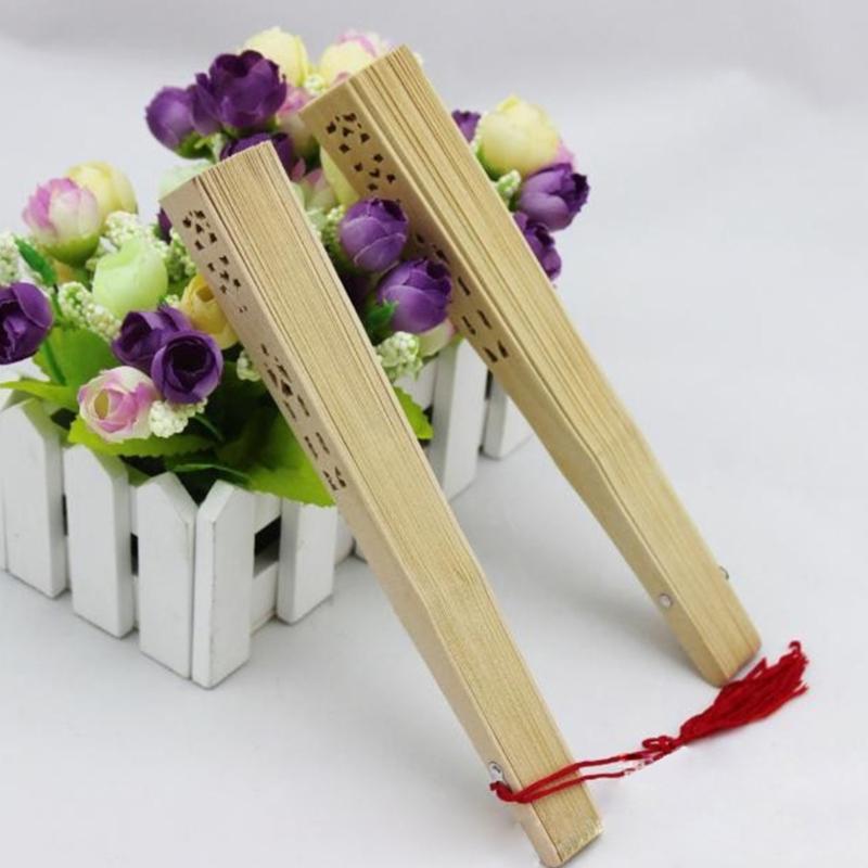 Portable Traditional Engraved Wooden Folding Fan With Lightweight Design Ideal For Cultural Celebrations