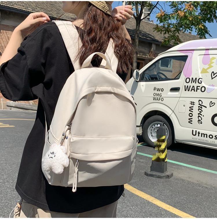 Korean Junior High Solid Color Backpack - Versatile & Stylish for Boys and Girls