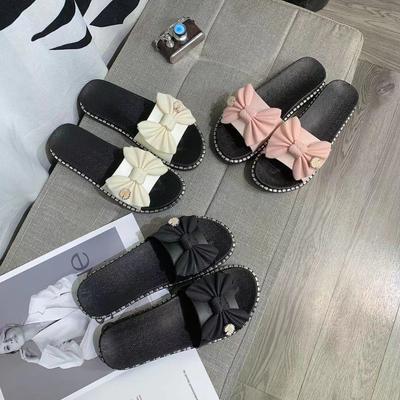 Корейские тапочки женская одежда 2025 новые летние плоские цветы одно слово мода интернет знаменитости классные тапочки пляжная обувь