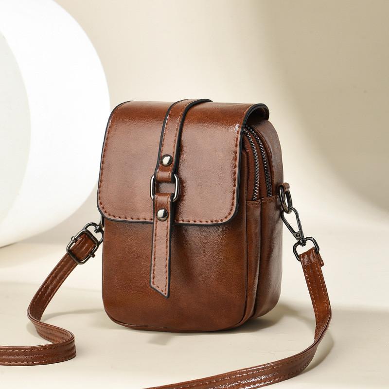 Mini Crossbody Stylish Bag For Women With Unique Lock Design Perfect For Everyday Use