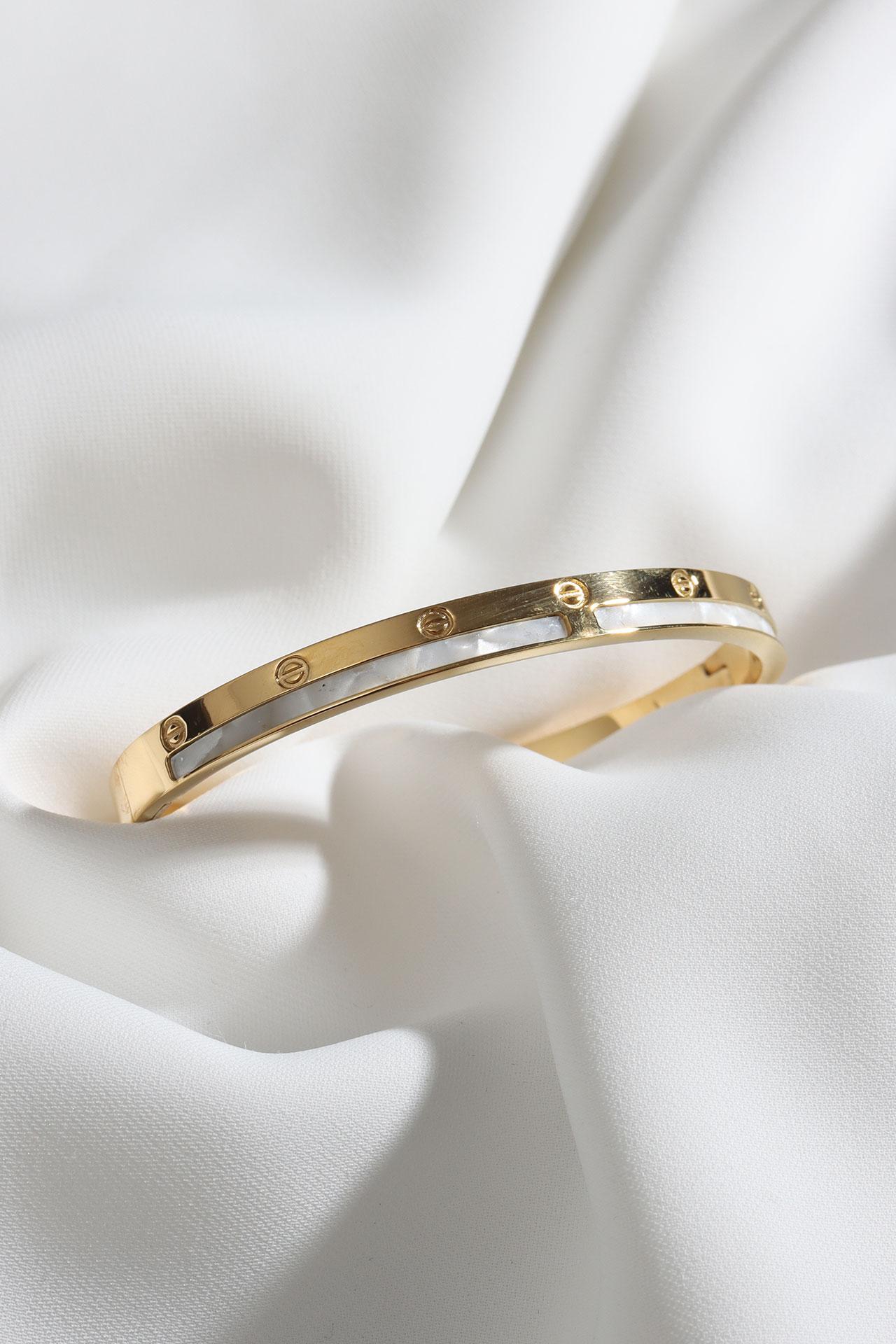 

Стальной браслет-наручники с перламутровым золотистым цветом