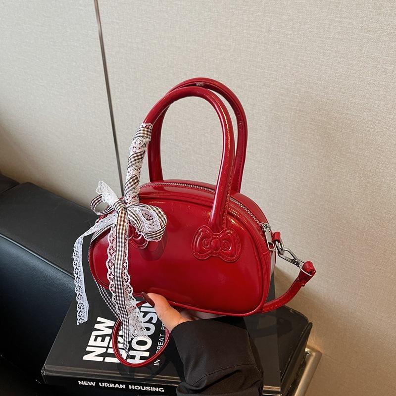 

Niche hand-carried bowling bag women s Korean version of fashionable versatile shoulder bag 2025 new simple casual messenger women s bag красный