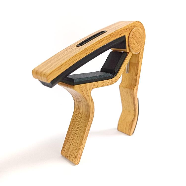 Guitar Medium Grip Wood Grain Capo with Card and Pick Slots