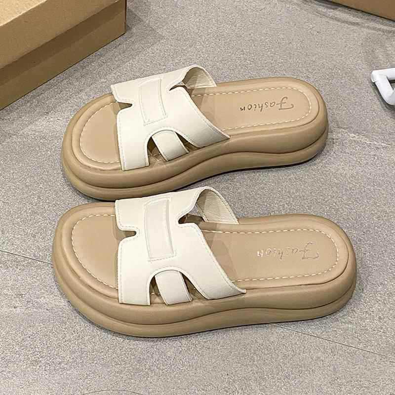 Thick-soled one-word slippers for women's summer wear 2025 new models with skirts French casual seaside beach sandals
