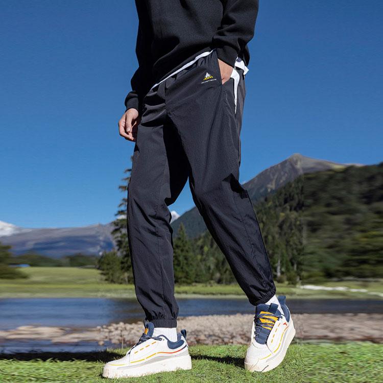 Anta Woven Loose Cuff Sports Pants Men Bottoms Black 952218515-3