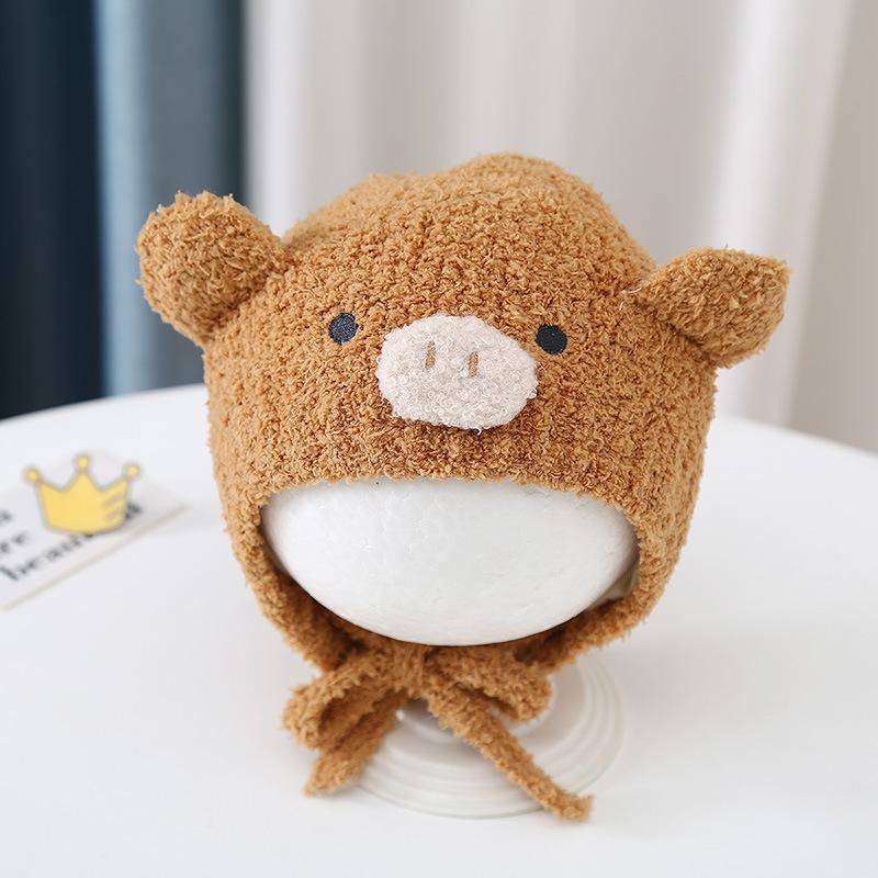 Autumn and winter cute piggy warm men and women children plush hat go out windproof hat baby ear hat baby hat