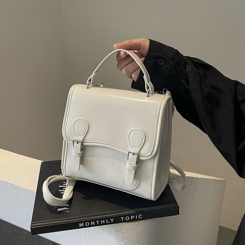 

Доступная роскошь Британский колледжский стиль Женские нишевые рюкзаки Beige White