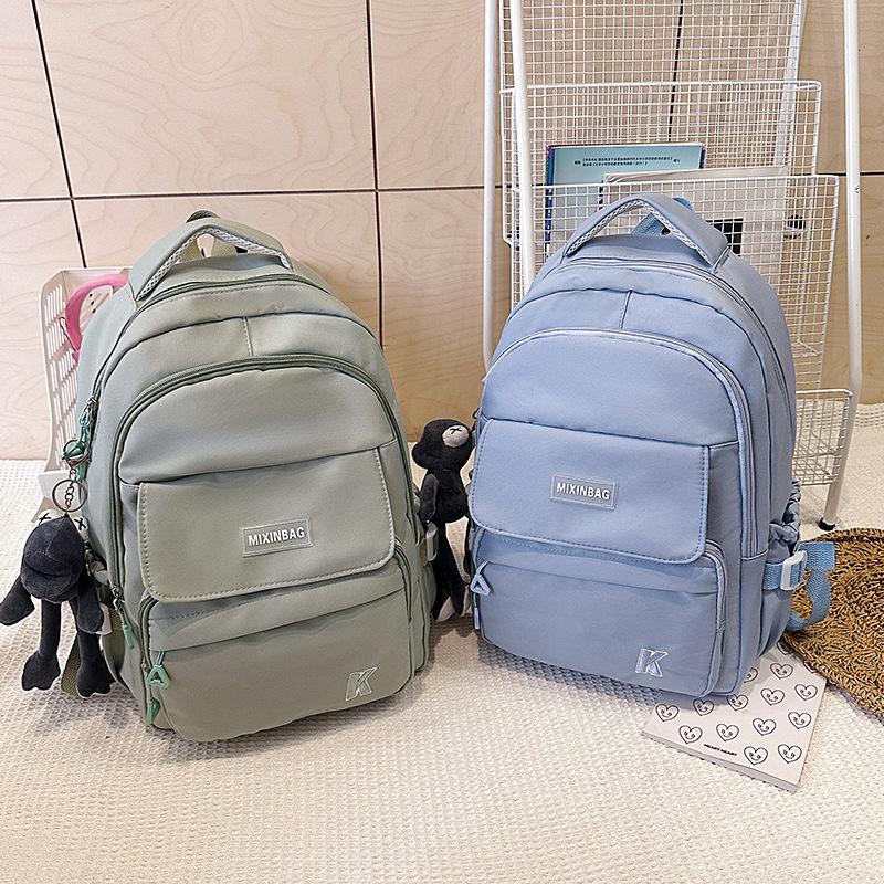 New large-capacity multi-compartment lightweight and versatile backpack fashionable junior high school high school student college backpack